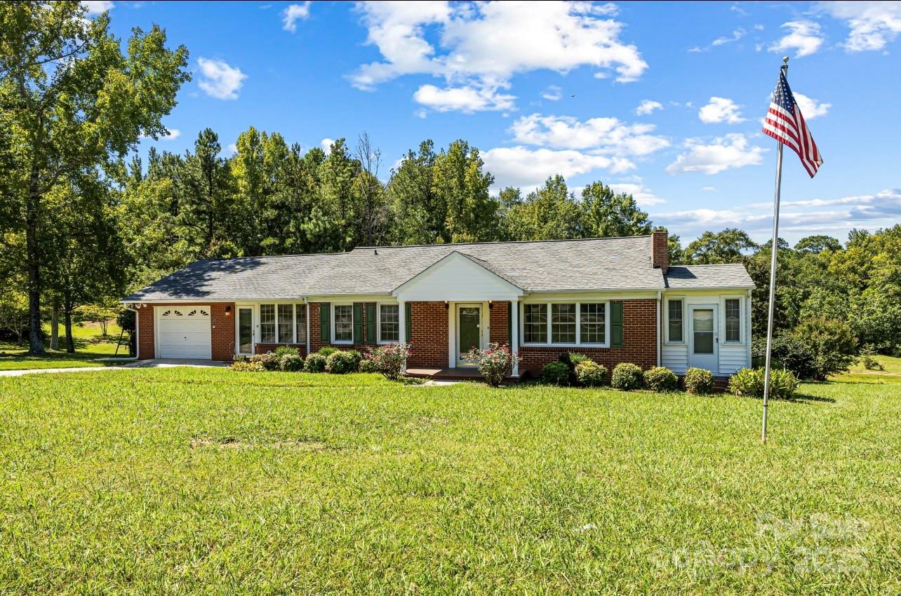 4462 Flat Creek Road Lancaster, SC 29720 - Photo 35 of 35 a front view of a house with garden