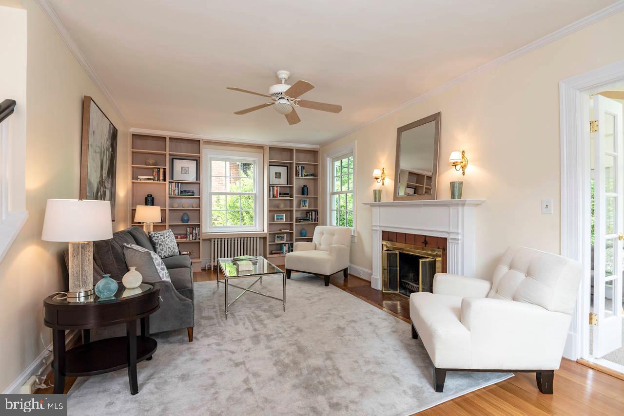 4330 37th Street Northwest Washington, DC 20008 - Photo 14 of 48 Large living room w/ wdb fireplace and built-ins