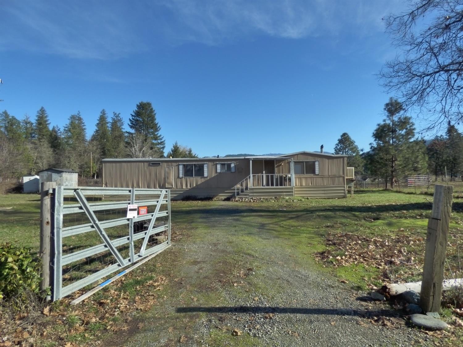 111 Dick George Road Cave Junction, OR 97523 - Photo 14 of 30 Main entry gate, of 3 total entries from