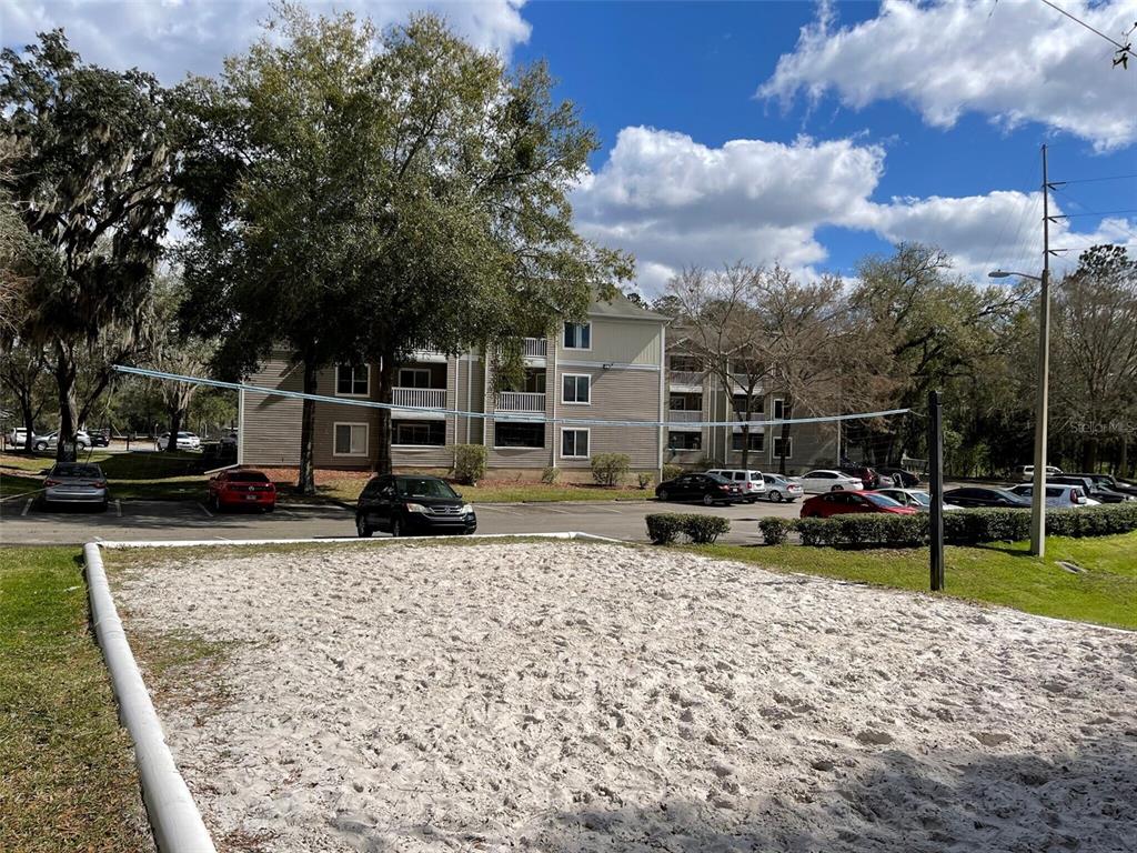4000 Southwest 23rd Street, Unit 4103 #4 Gainesville, FL 32608 - Photo 15 of 17 a view of a backyard with sitting area