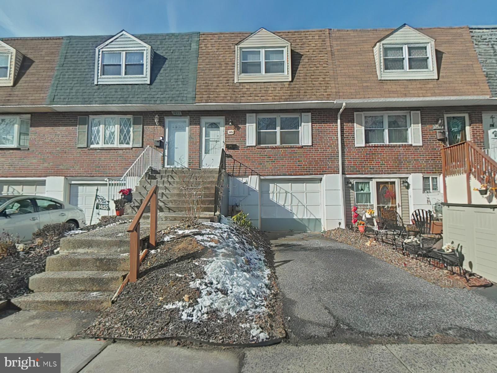 1453 Rainer Road Brookhaven, PA 19015 - Photo 1 of 1 a front view of a house with a yard