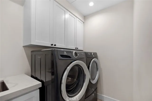 a view of balcony with wooden floor and outdoor seating