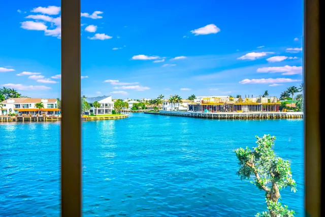 a view of a city with an ocean view