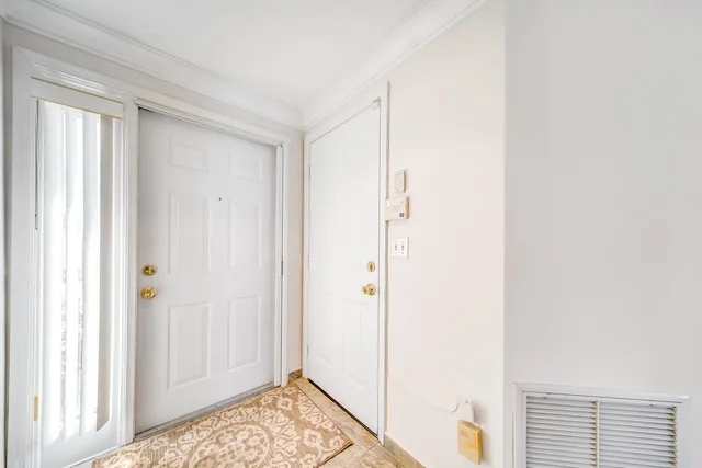 a view of bedroom with window
