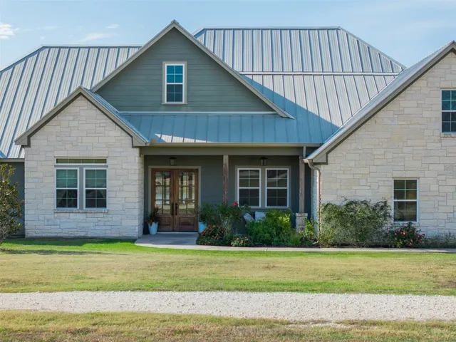a view of a house with a swimming pool