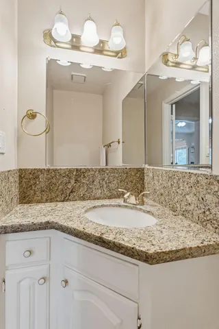 an aerial view of residential building with green space