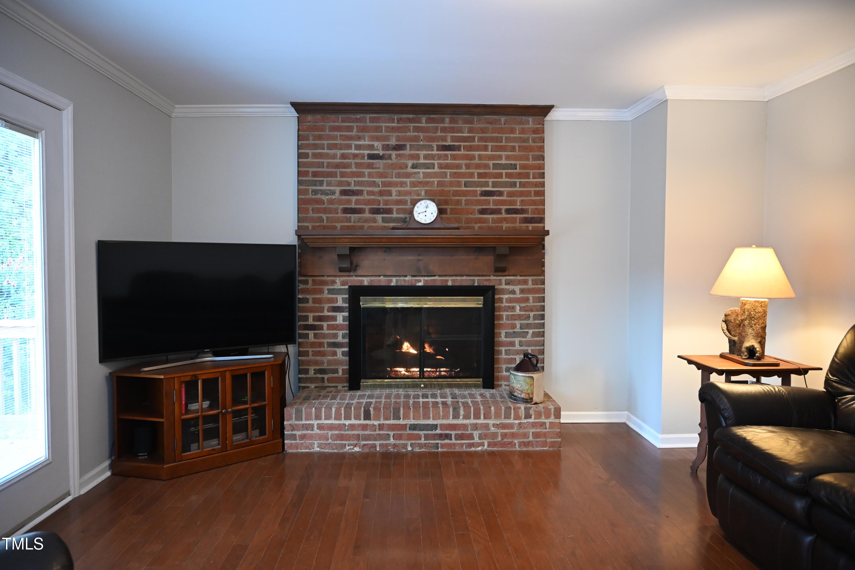 5012 Knaresborough Road Raleigh, NC 27612 - Photo 16 of 35 Fireplace in family room