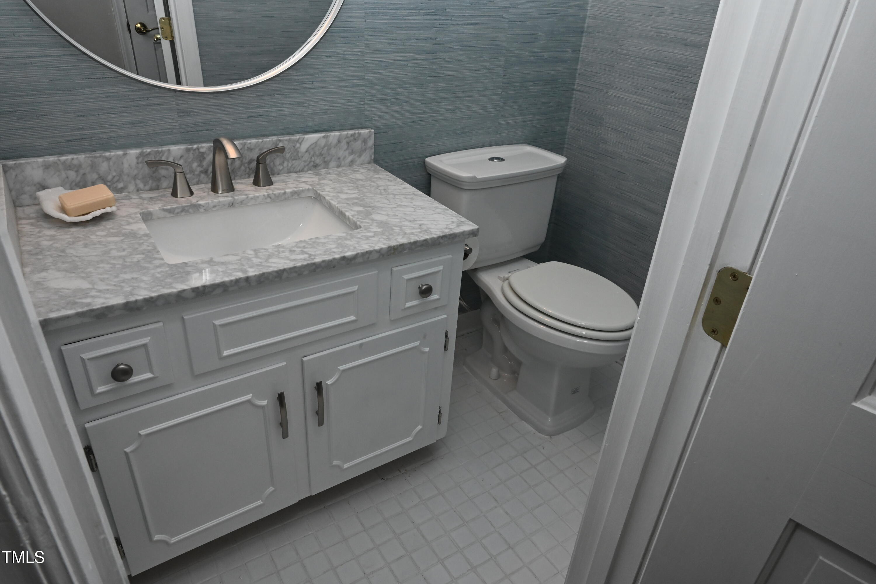 5012 Knaresborough Road Raleigh, NC 27612 - Photo 17 of 35 Half bath