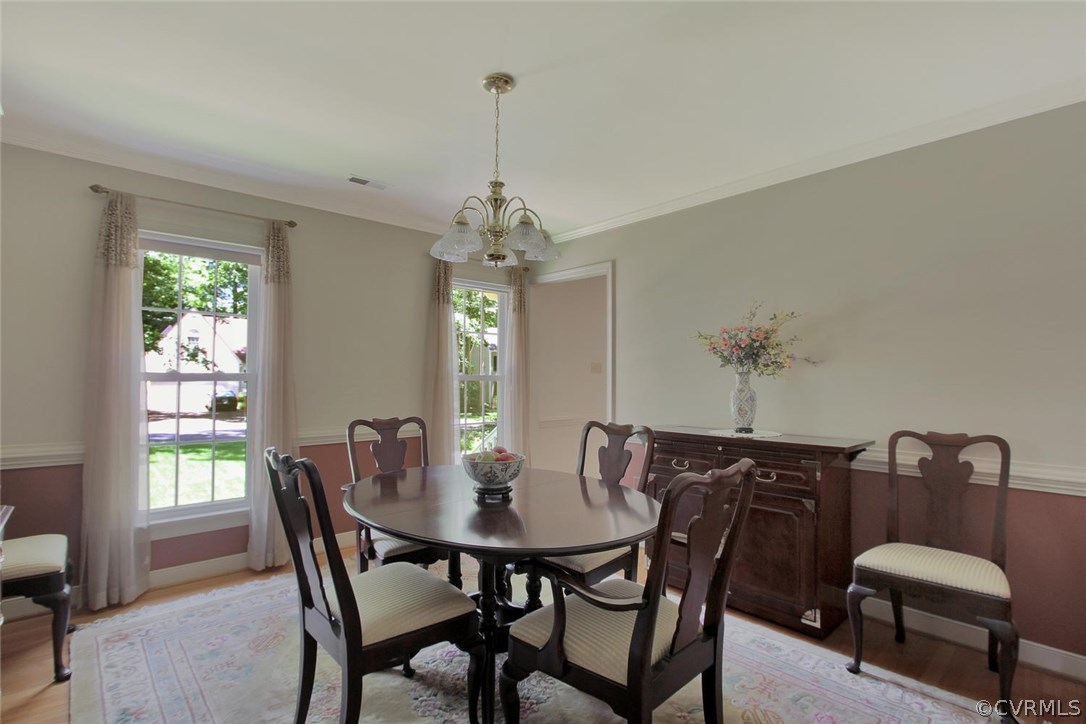13808 Shadow Ridge Road Midlothian, VA 23112 - Photo 5 of 29 a view of a dining room with furniture and chandelier