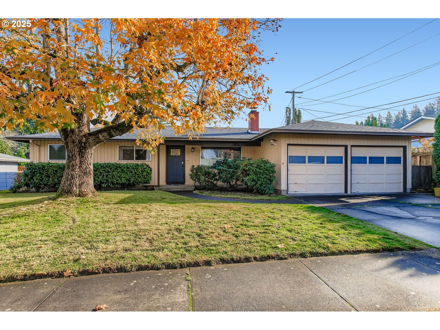 830 Southeast 214th Avenue Gresham, OR 97030 - Photo 1 of 30 a front view of a house with a garden