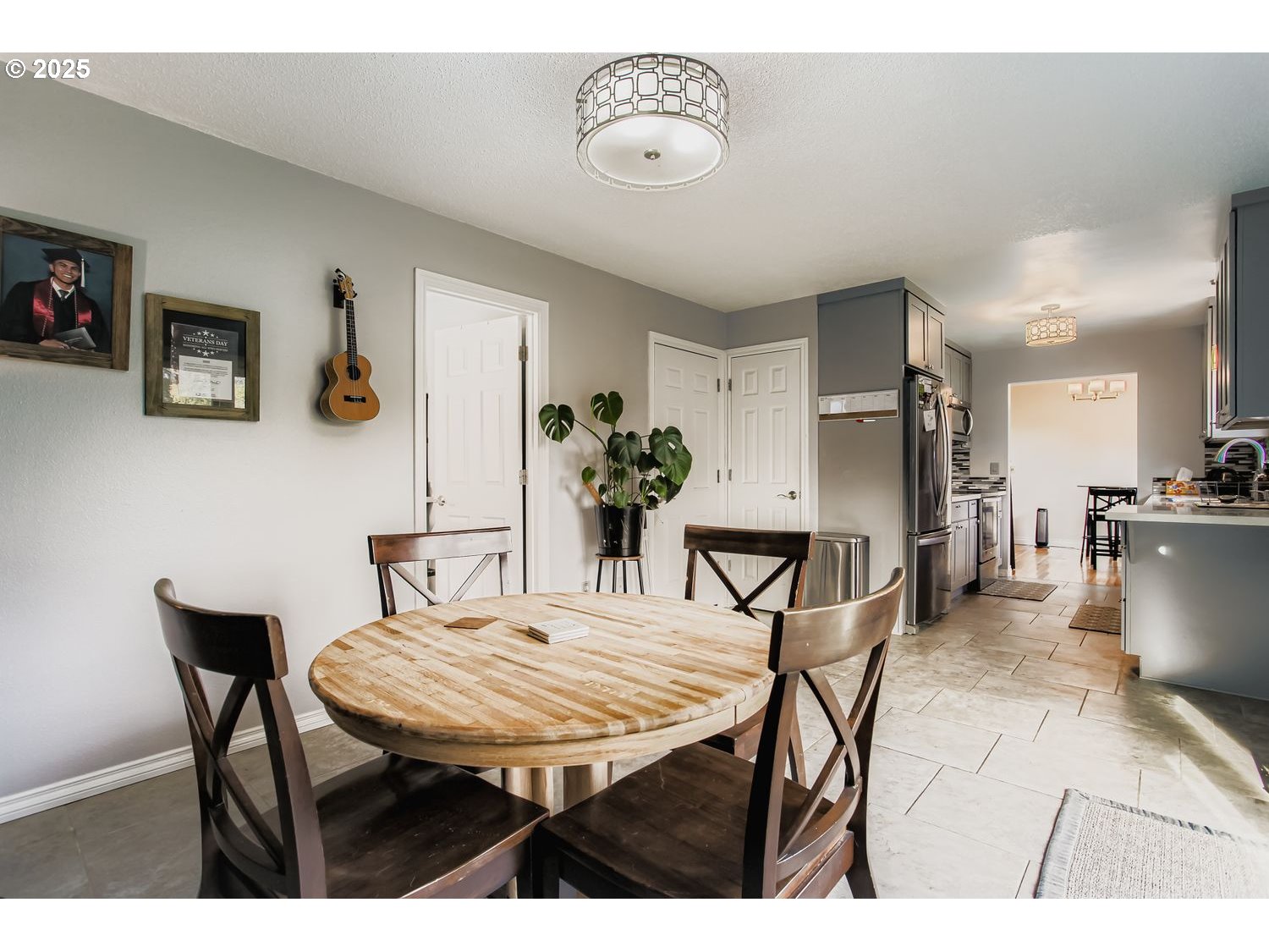 830 Southeast 214th Avenue Gresham, OR 97030 - Photo 16 of 30 a view of a dining room with furniture and wooden floor