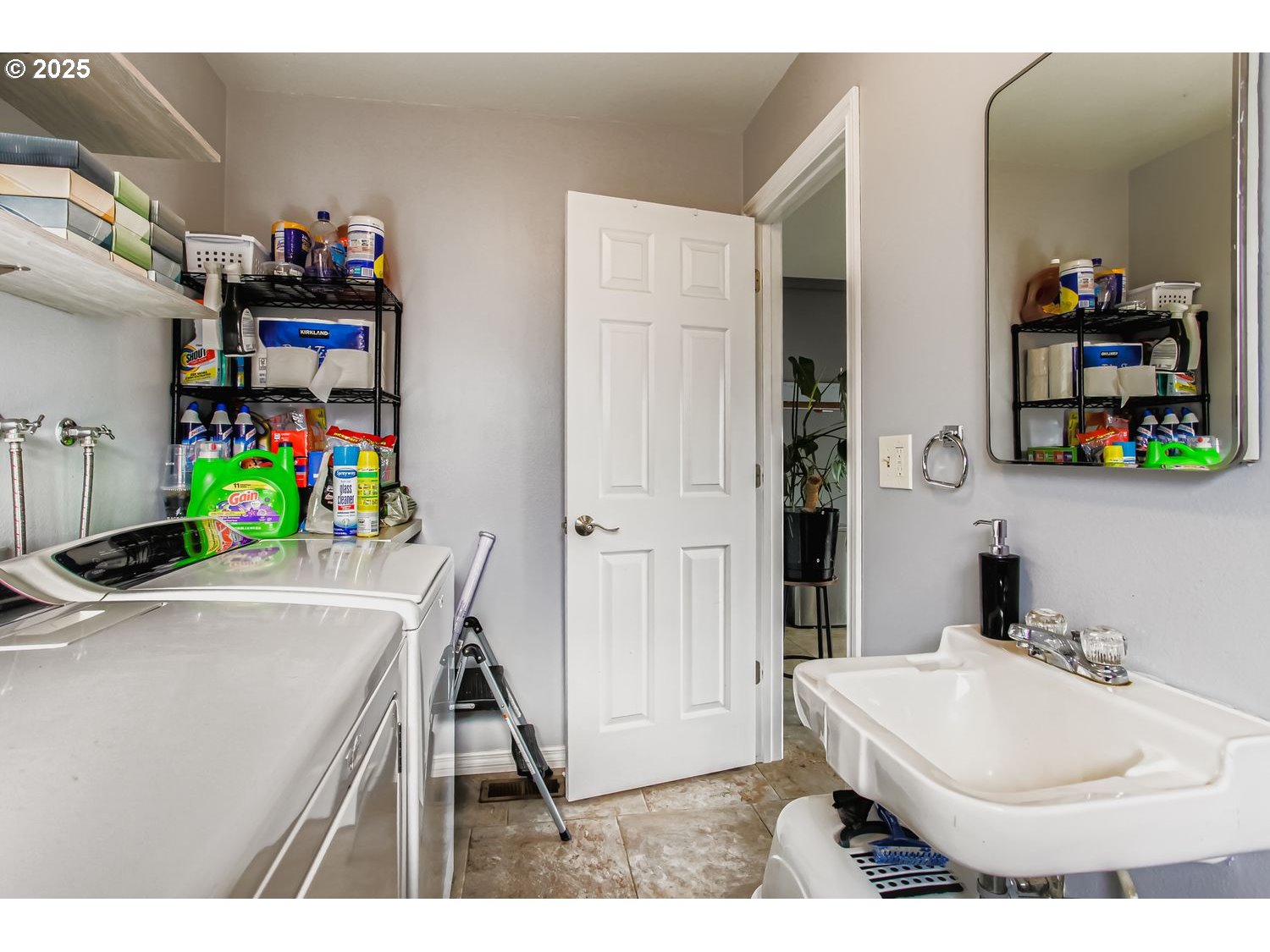 830 Southeast 214th Avenue Gresham, OR 97030 - Photo 25 of 30 a bathroom with a sink a vanity and a mirror