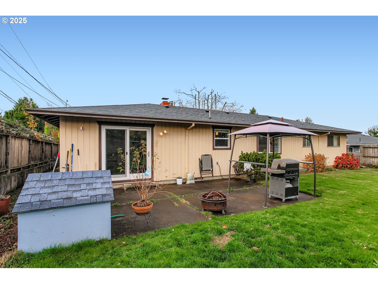 830 Southeast 214th Avenue Gresham, OR 97030 - Photo 30 of 30 a backyard of a house with seating space