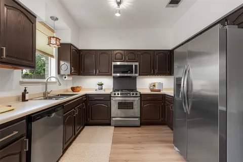$584,000 | 7516 Windrush Drive, Austin, TX 78729
