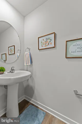 a room with flowers in wooden floor