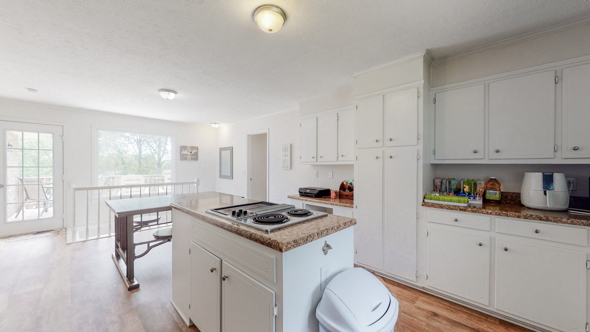 211 Old Horn Springs Road Lebanon, TN 37087 - Photo 11 of 43 a kitchen with sink cabinets and wooden floor