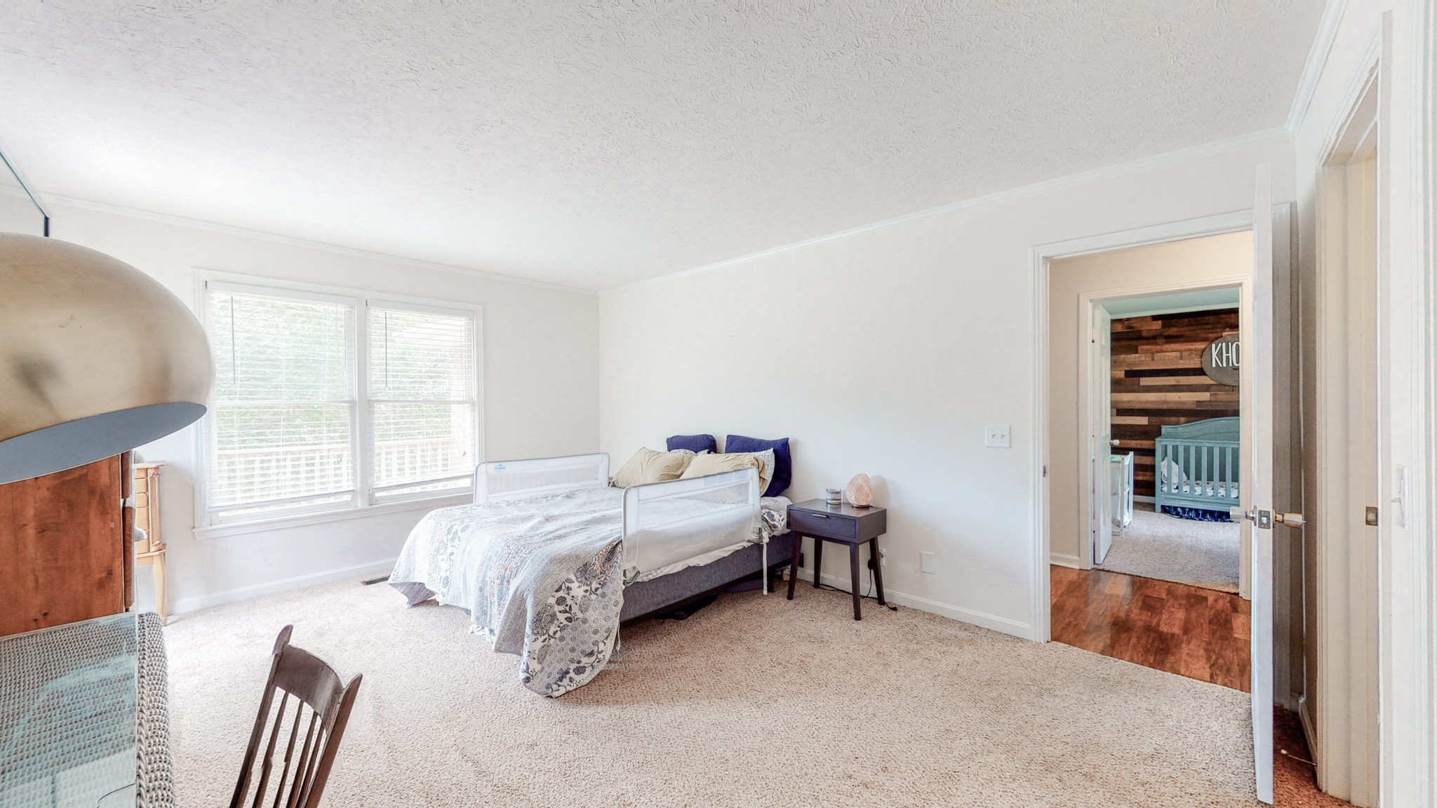 211 Old Horn Springs Road Lebanon, TN 37087 - Photo 15 of 43 a bedroom with a bed and a window