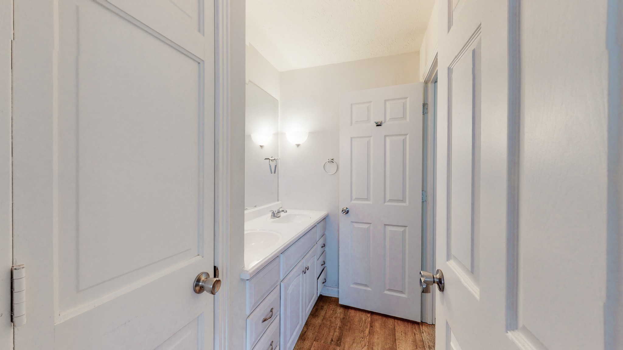 211 Old Horn Springs Road Lebanon, TN 37087 - Photo 18 of 43 a spacious bathroom with a double vanity sink a mirror and a bathtub