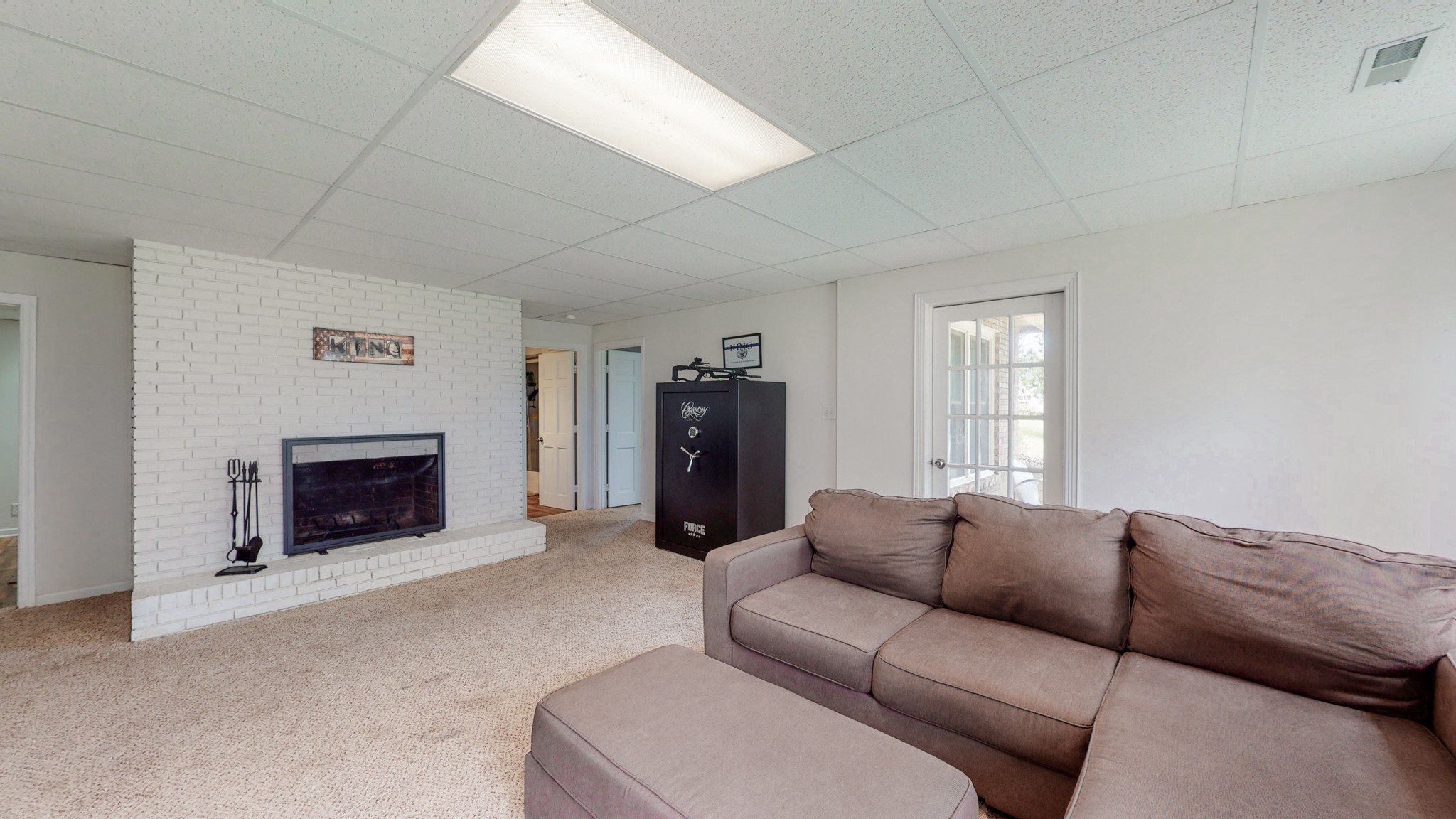 211 Old Horn Springs Road Lebanon, TN 37087 - Photo 23 of 43 a living room with furniture and a fireplace