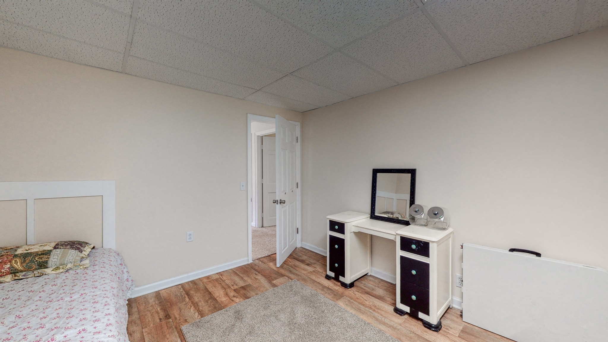 211 Old Horn Springs Road Lebanon, TN 37087 - Photo 28 of 43 a bedroom with a bed and cabinets
