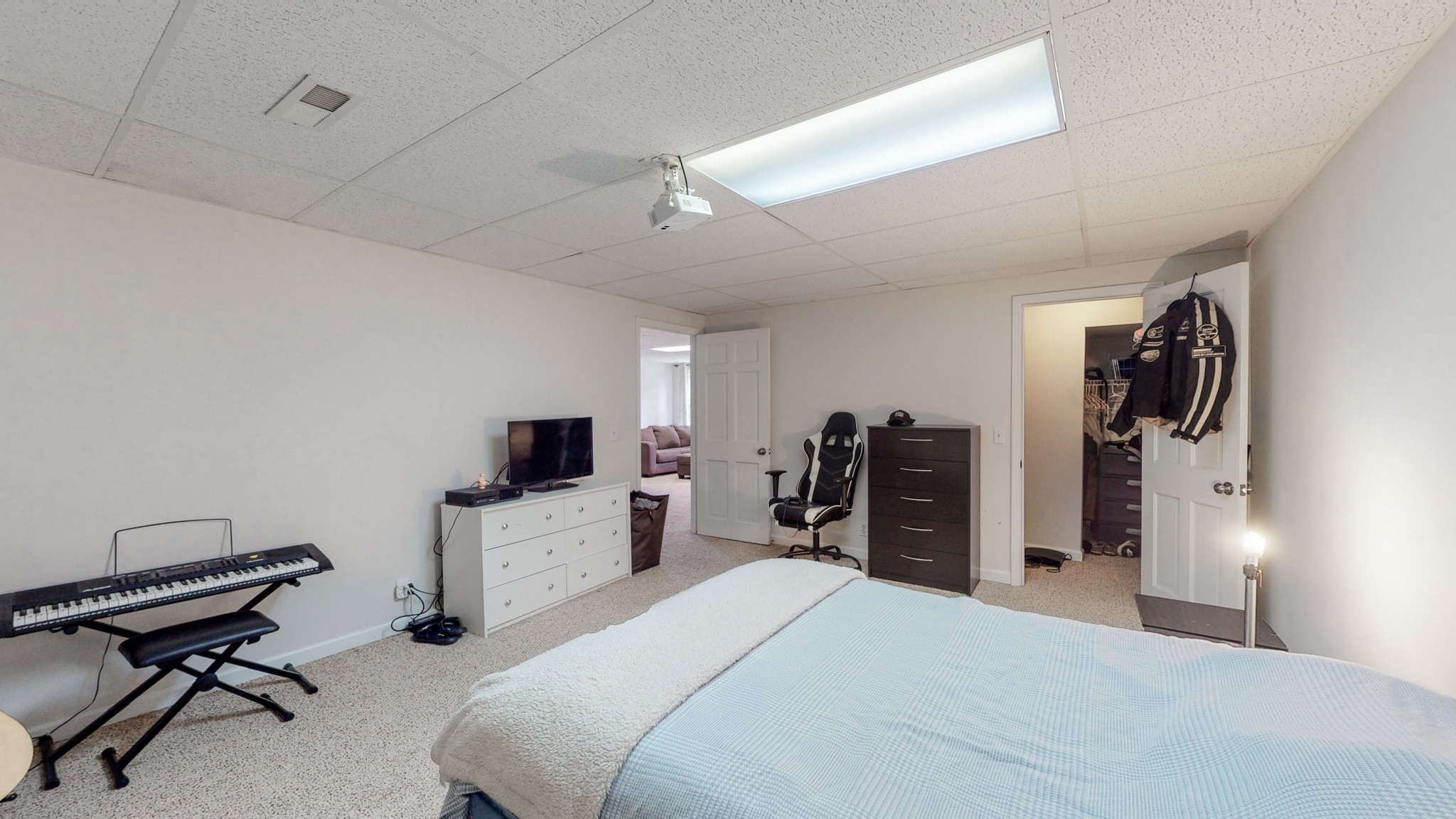 211 Old Horn Springs Road Lebanon, TN 37087 - Photo 30 of 43 a bedroom with a bed and a desk in it