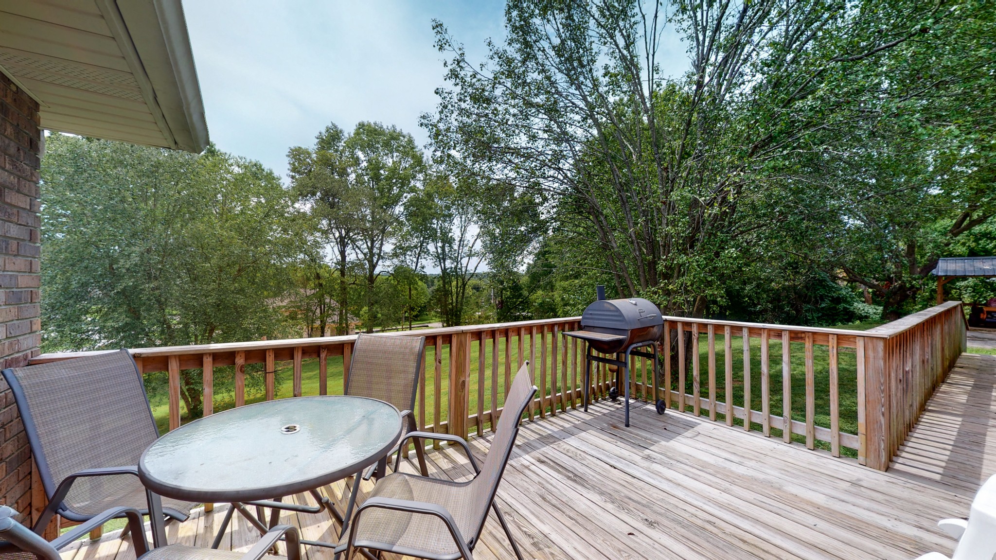 211 Old Horn Springs Road Lebanon, TN 37087 - Photo 31 of 43 a view of a chair in wooden deck