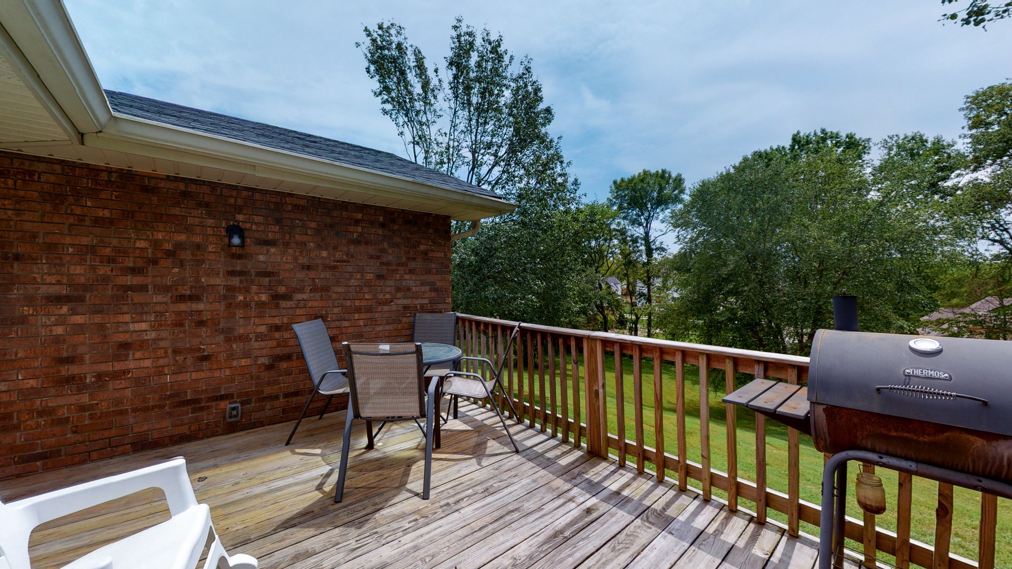 211 Old Horn Springs Road Lebanon, TN 37087 - Photo 32 of 43 a balcony with wooden floor and outdoor seating