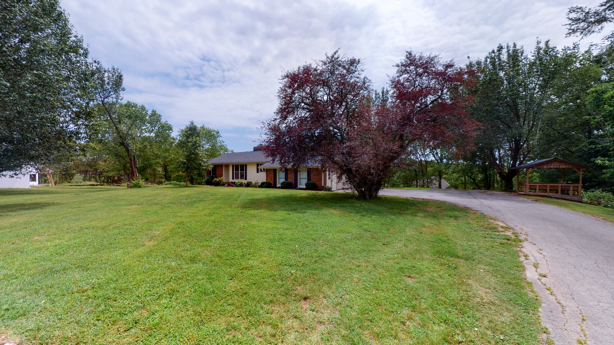 211 Old Horn Springs Road Lebanon, TN 37087 - Photo 40 of 43 a view of a house with a big yard