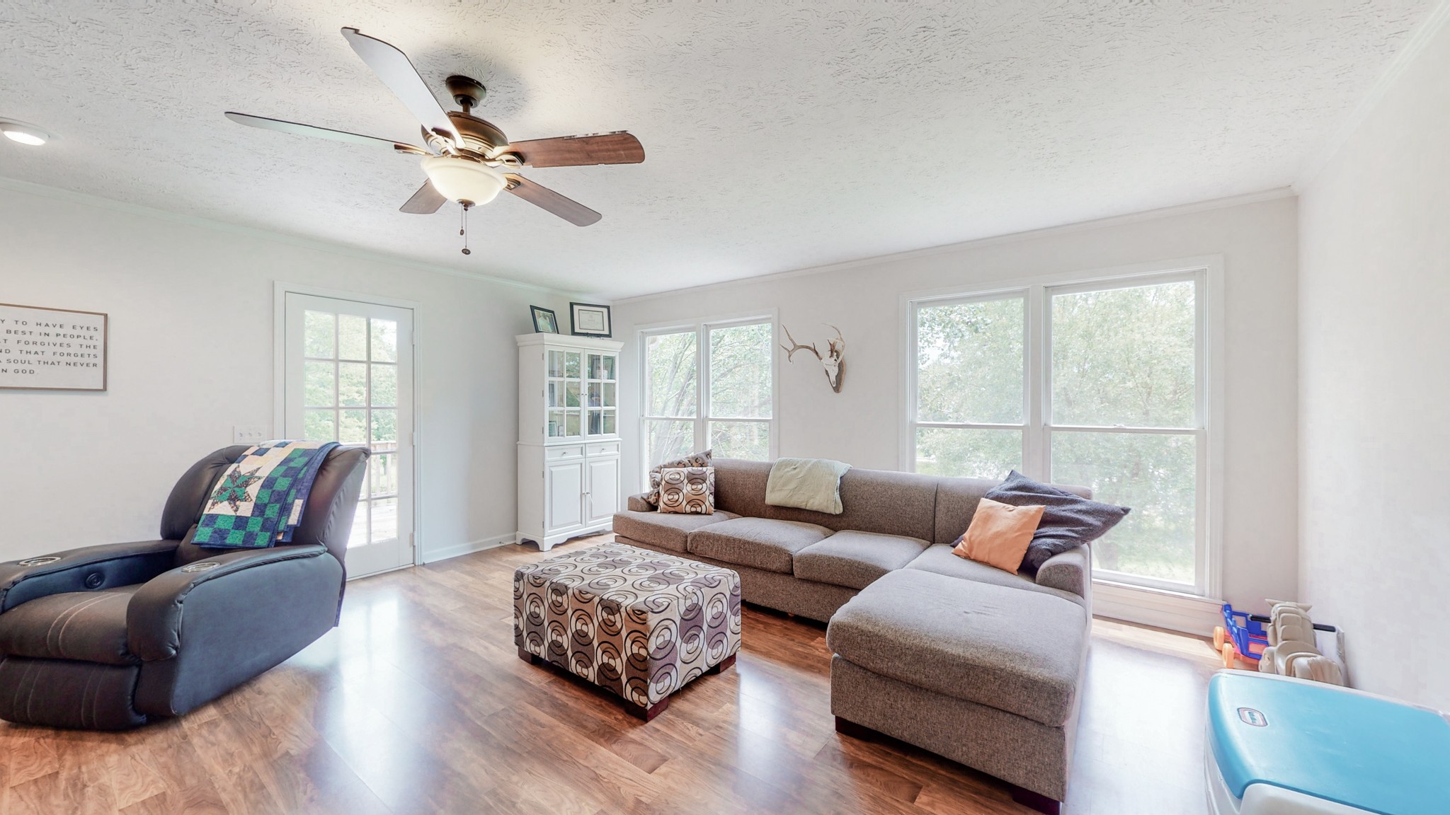 211 Old Horn Springs Road Lebanon, TN 37087 - Photo 6 of 43 a living room with furniture wooden floor and a window