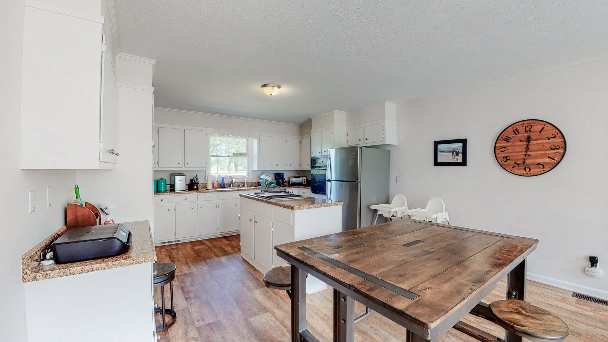 211 Old Horn Springs Road Lebanon, TN 37087 - Photo 9 of 43 a kitchen with a table and chairs
