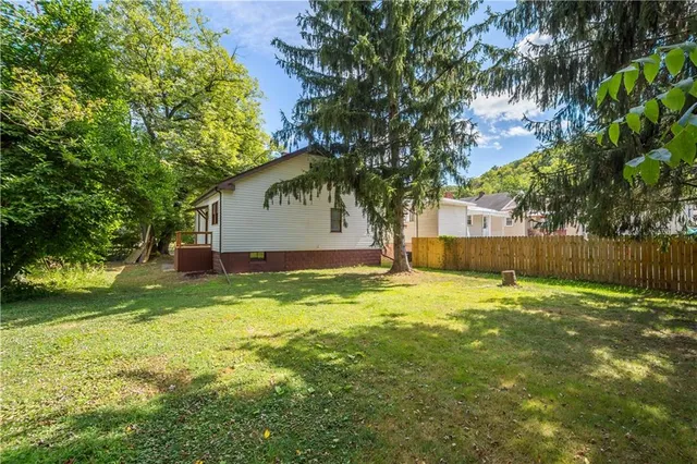 a fire hydrant in the middle of a field