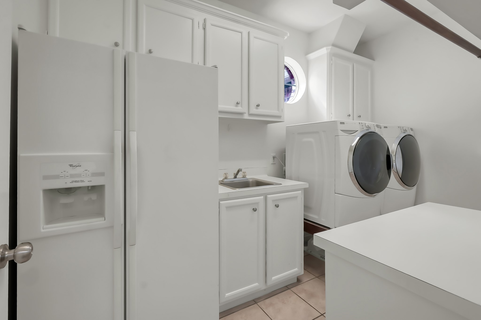 16403 Agusta Court Spring, TX 77379 - Photo 17 of 36 a utility room with sink dryer and washer