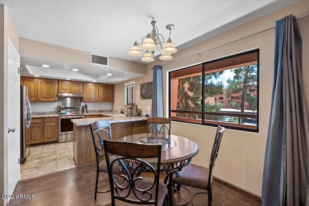 4303 East Cactus Road, Unit 207 Phoenix, AZ 85032 - Photo 12 of 35 07-Dining Room