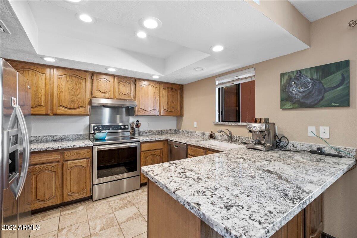 4303 East Cactus Road, Unit 207 Phoenix, AZ 85032 - Photo 10 of 35 09-Kitchen