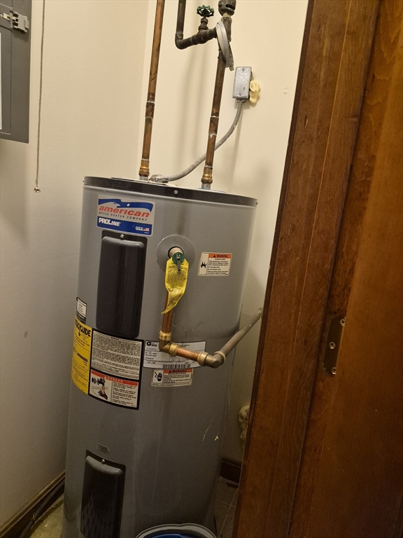 333 1st Street, Unit 209 Lowell, MA 01850 - Photo 4 of 16 a utility room with dryer and washer