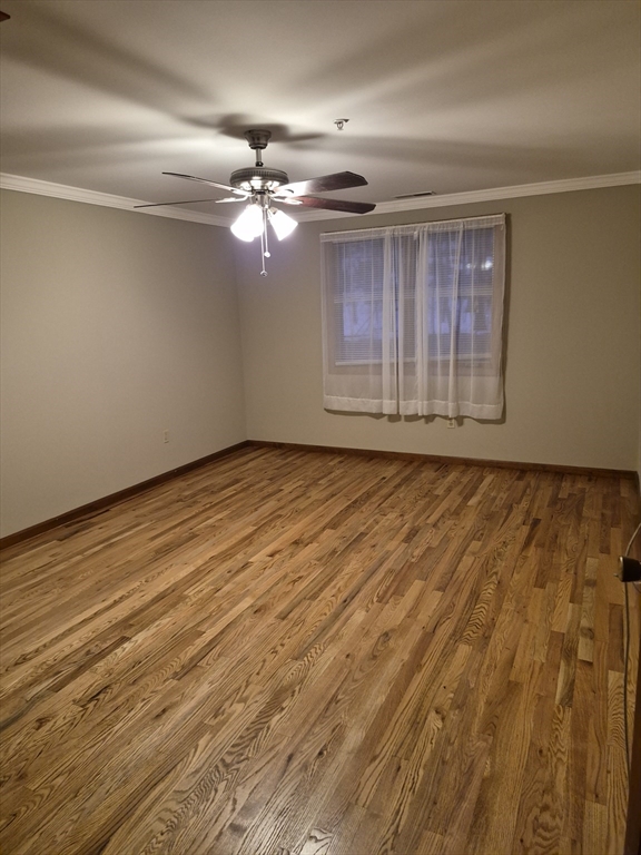 333 1st Street, Unit 209 Lowell, MA 01850 - Photo 9 of 16 a view of an empty room with a window