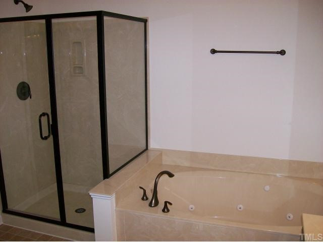 909 Lakeview Road Durham, NC 27712 - Photo 6 of 12 Master bath complete with separate shower and whirlpool tub Master Bath/Spa