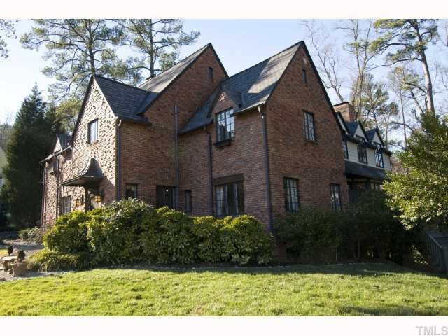 3936 Dover Road Durham, NC 27707 - Photo 1 of 12 Influenced by Old World styles brought back from Europe after World War I an insurgence of Tudor architecture erupted in the United States. Eclectic and asymmetrical by choice, Tudor homes are solid masonry with elaborate, decorative brickwork. Exterior Front