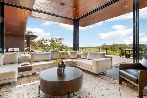 a living room with couches and a coffee table