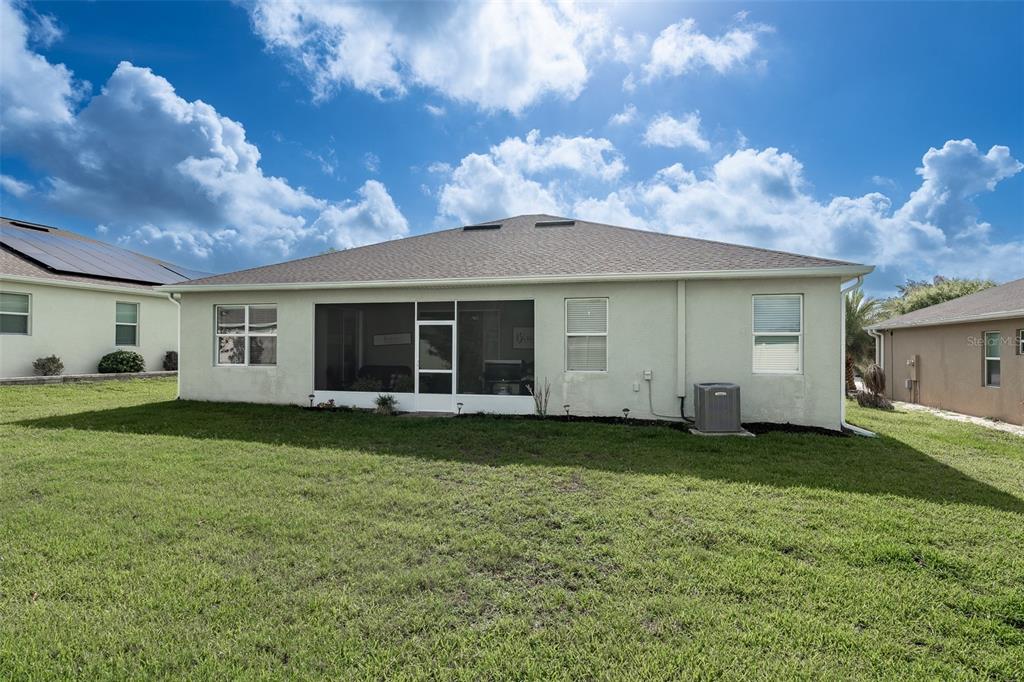 9224 Southwest 60th Ct Road Ocala, FL 34476 - Photo 44 of 55 a view of a house with a garden