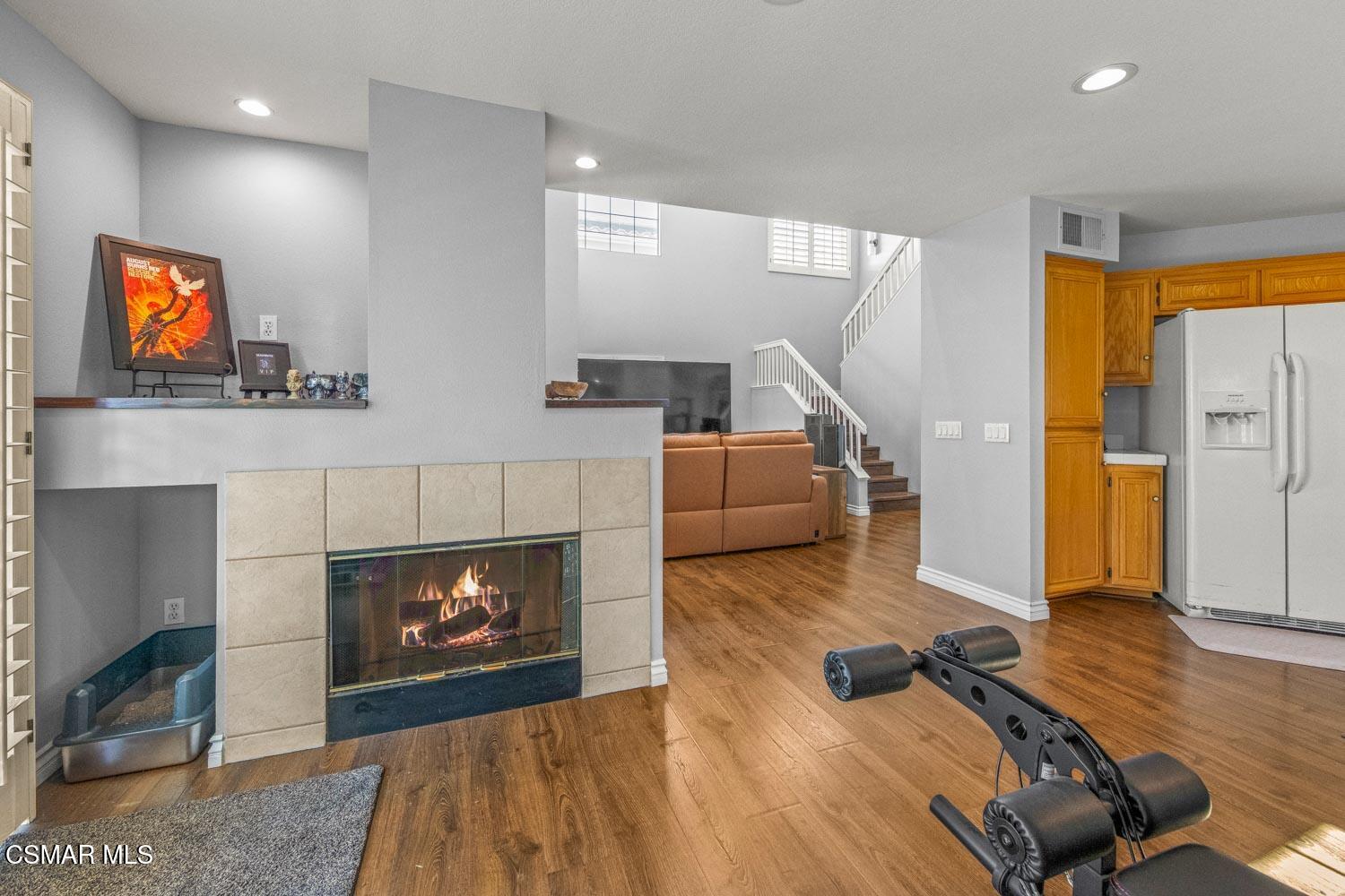 1741 Chaps Court Simi Valley, CA 93063 - Photo 13 of 28 a living room with furniture and a fireplace