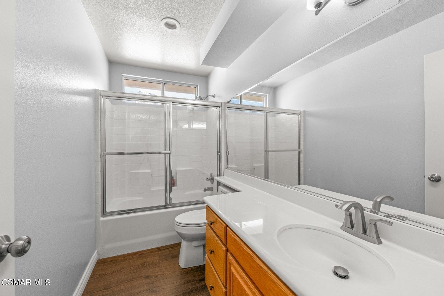 1741 Chaps Court Simi Valley, CA 93063 - Photo 15 of 28 a bathroom with a sink toilet and shower