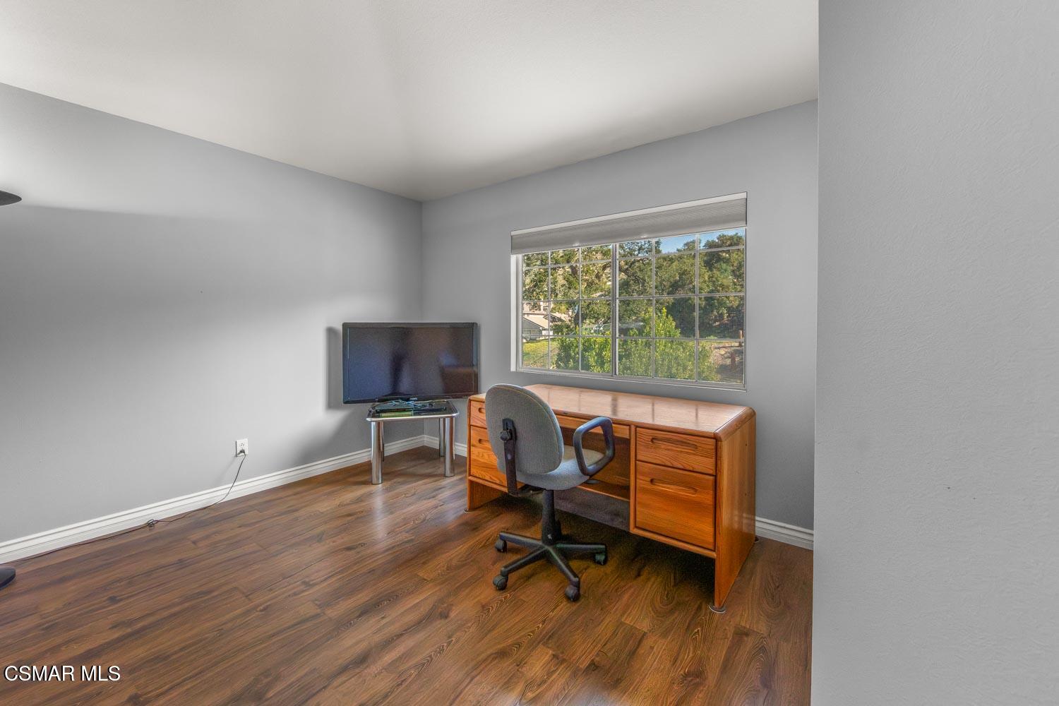 1741 Chaps Court Simi Valley, CA 93063 - Photo 16 of 28 a view of a workspace with furniture and a window