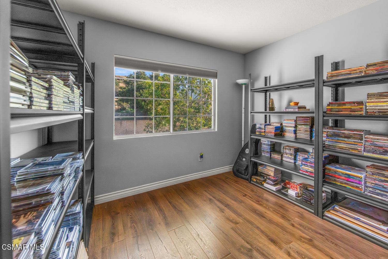 1741 Chaps Court Simi Valley, CA 93063 - Photo 18 of 28 a room with lots of books and a window
