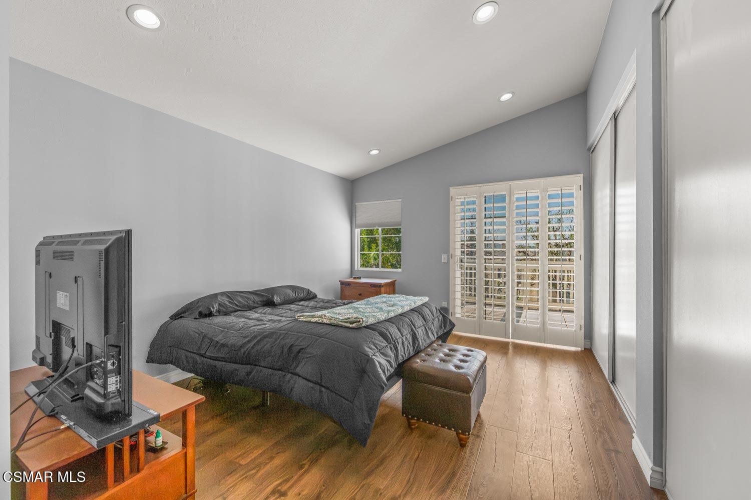 1741 Chaps Court Simi Valley, CA 93063 - Photo 20 of 28 a bed sitting in a spacious bedroom next to a window