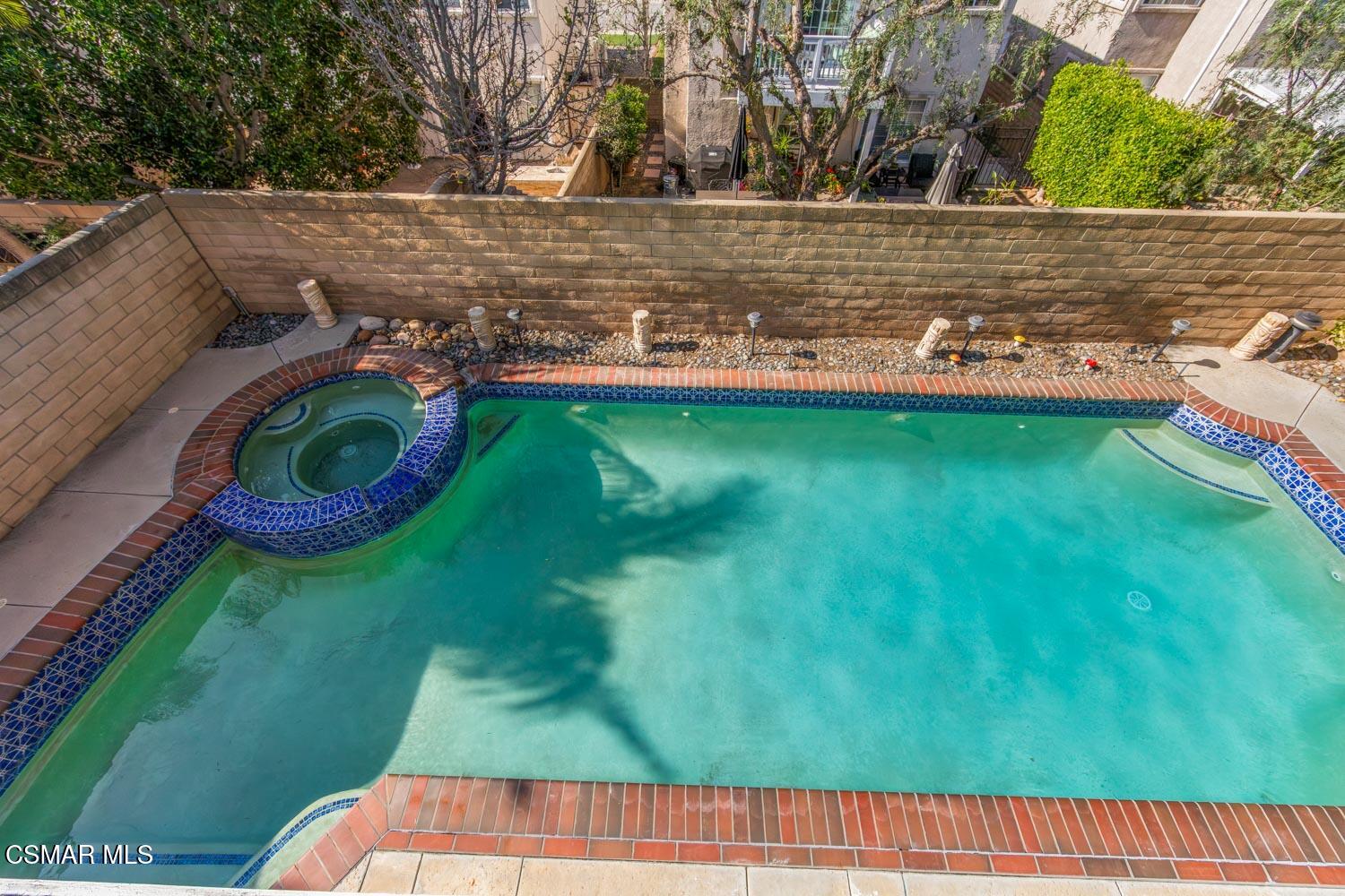1741 Chaps Court Simi Valley, CA 93063 - Photo 24 of 28 a view of yard with swimming pool and seating area