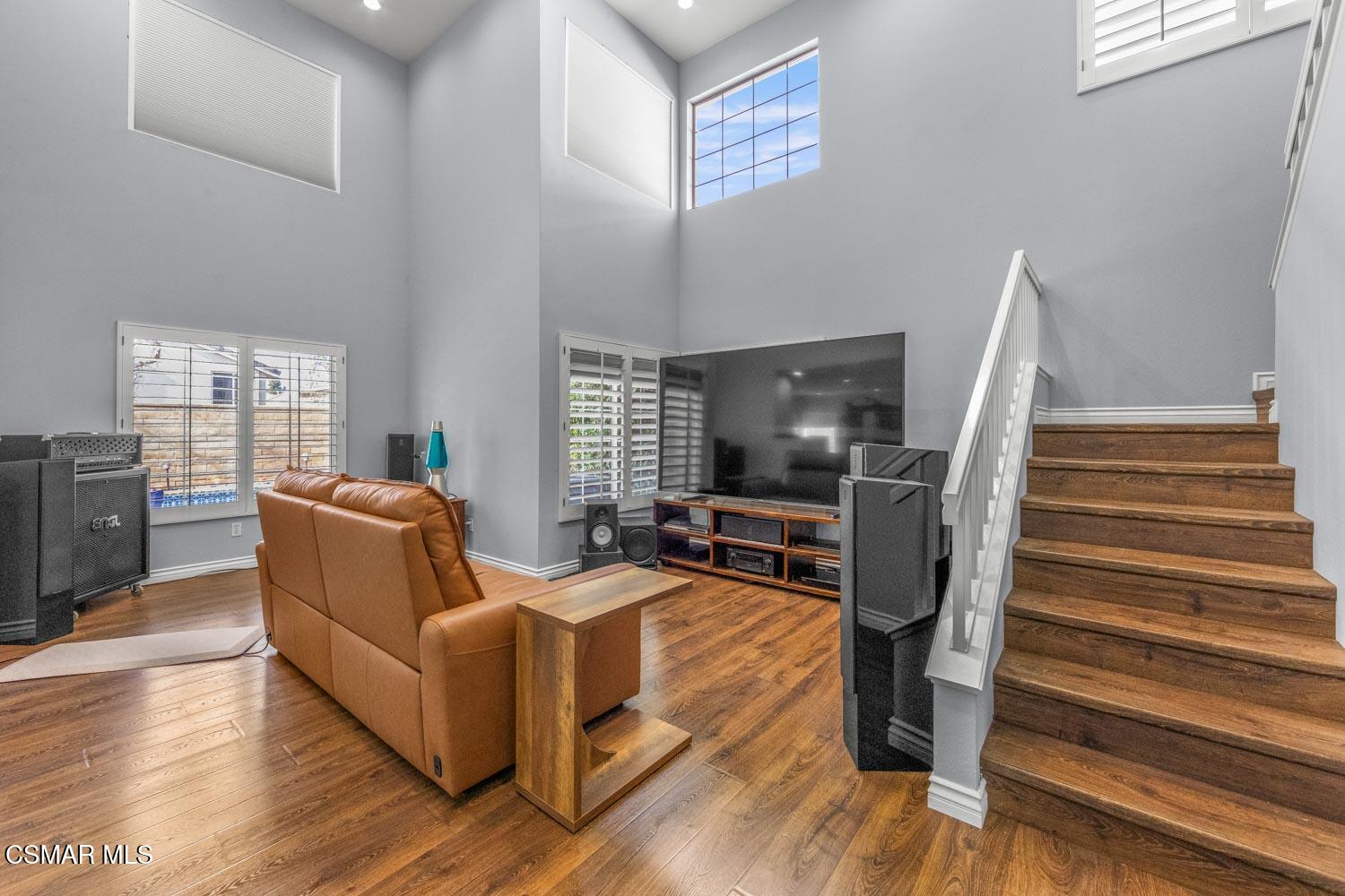 1741 Chaps Court Simi Valley, CA 93063 - Photo 5 of 28 a living room with furniture fireplace and wooden floor