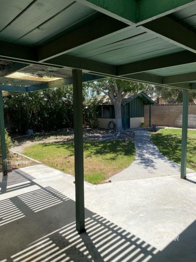 535 West Kevin Court Ridgecrest, CA 93555 - Photo 16 of 19 a view of a backyard