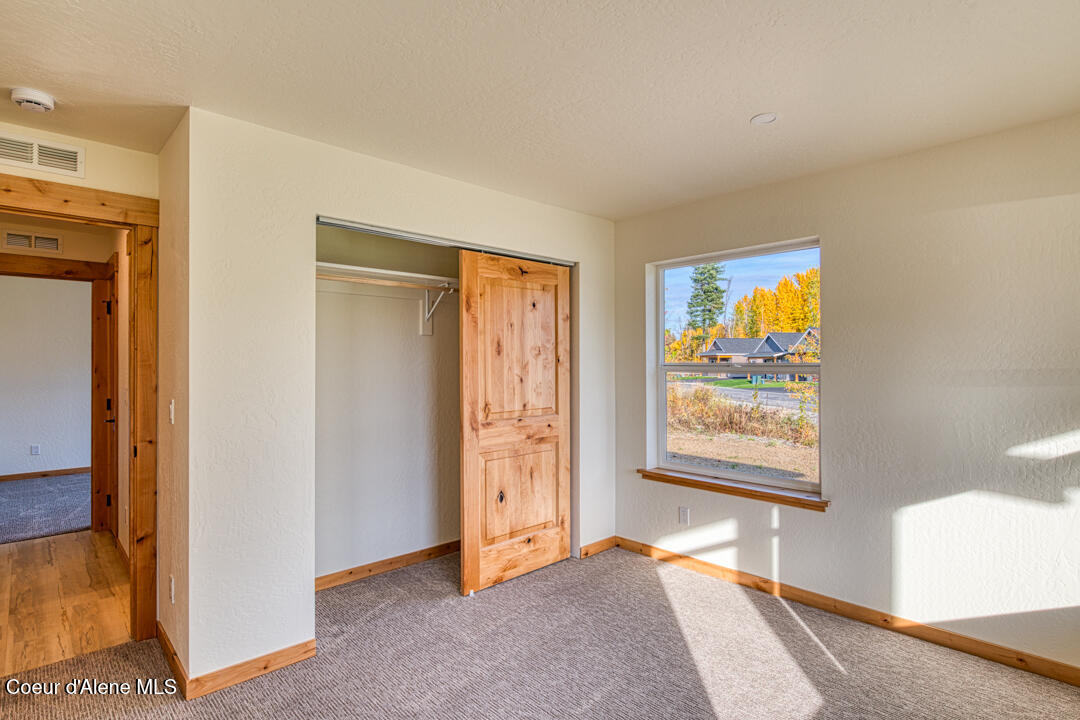 296 Jasper Loop Ponderay, ID 83852 - Photo 23 of 33 Bedroom 3