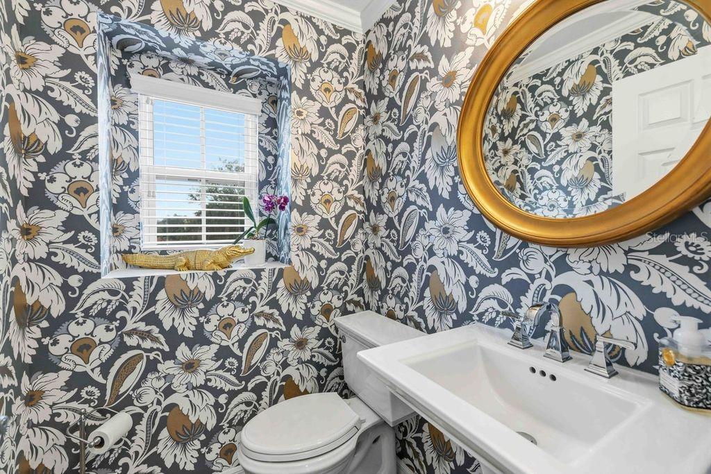9040 White Sage Loop Lakewood Ranch, FL 34202 - Photo 17 of 59 a bathroom with a sink and a mirror